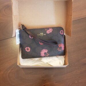 Patterned Coach Wristlet